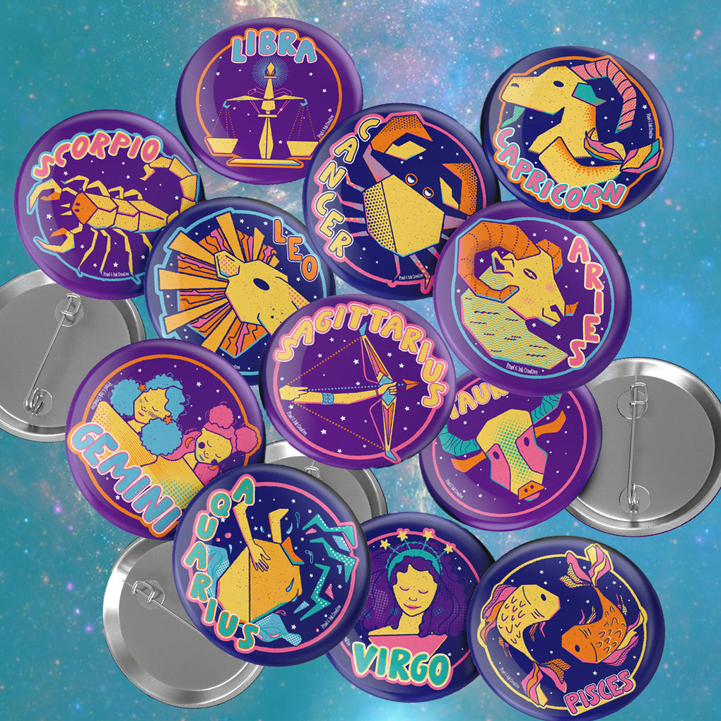 Collection of colorful zodiac buttons on a blue starry background