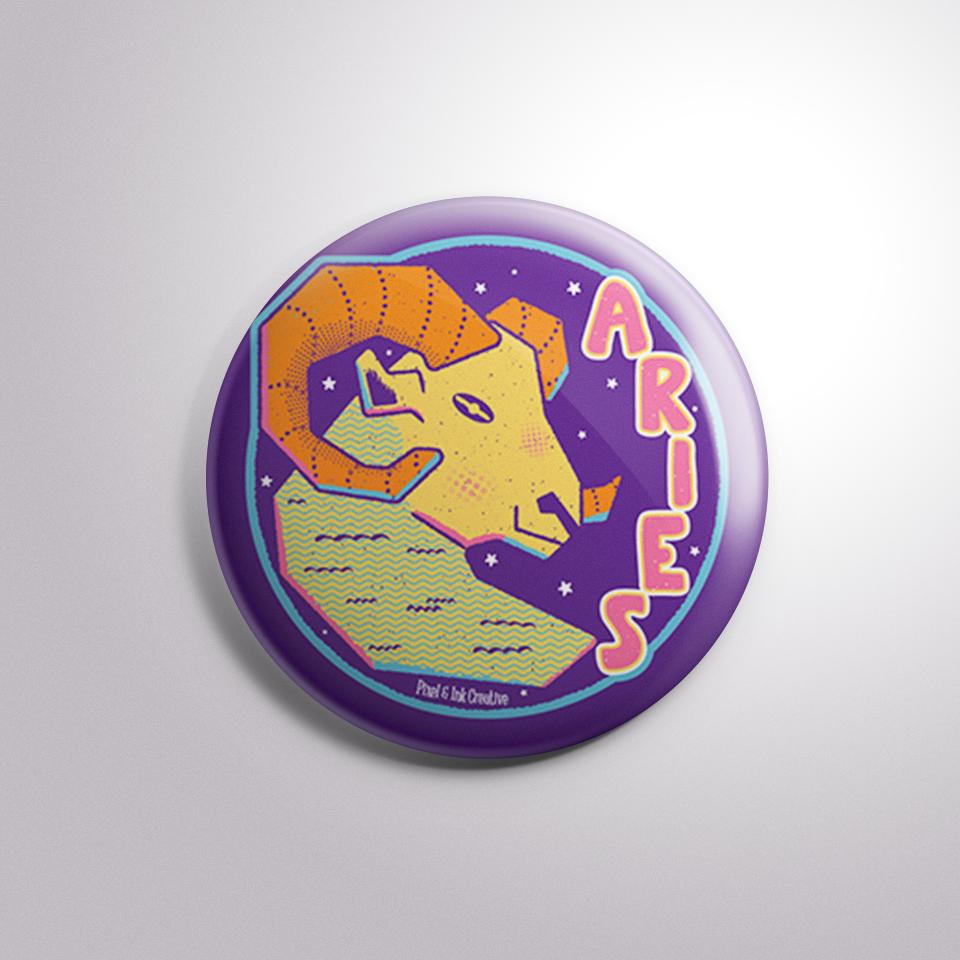 Button badge with Aries zodiac sign design on a purple background
