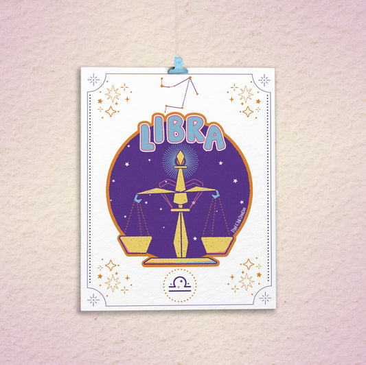 Libra zodiac sign poster with star design on a textured wall.